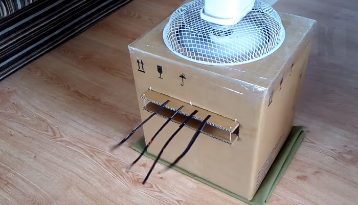 Коробка с вставленной кастрюлей и пристроенным вентилятором